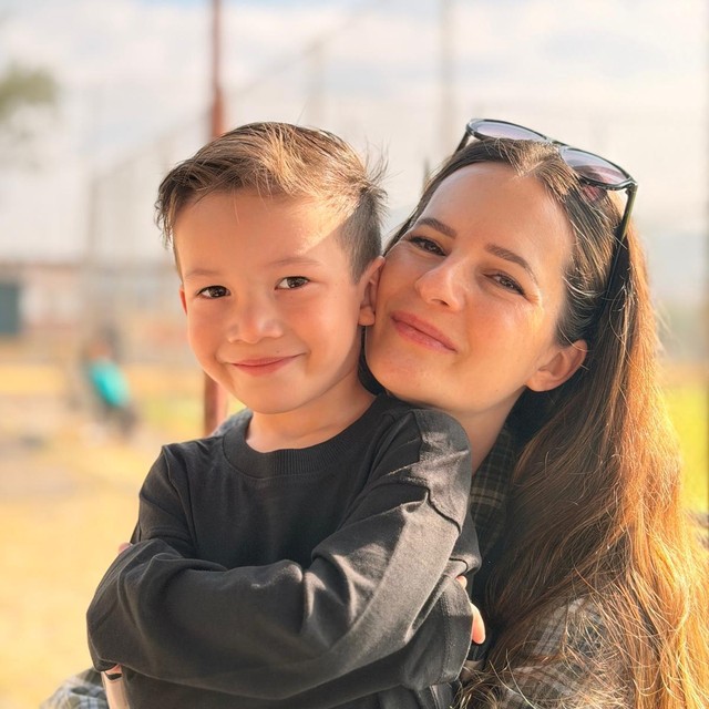 Jordan Velazquez, founder of Networthy, with one of her sons